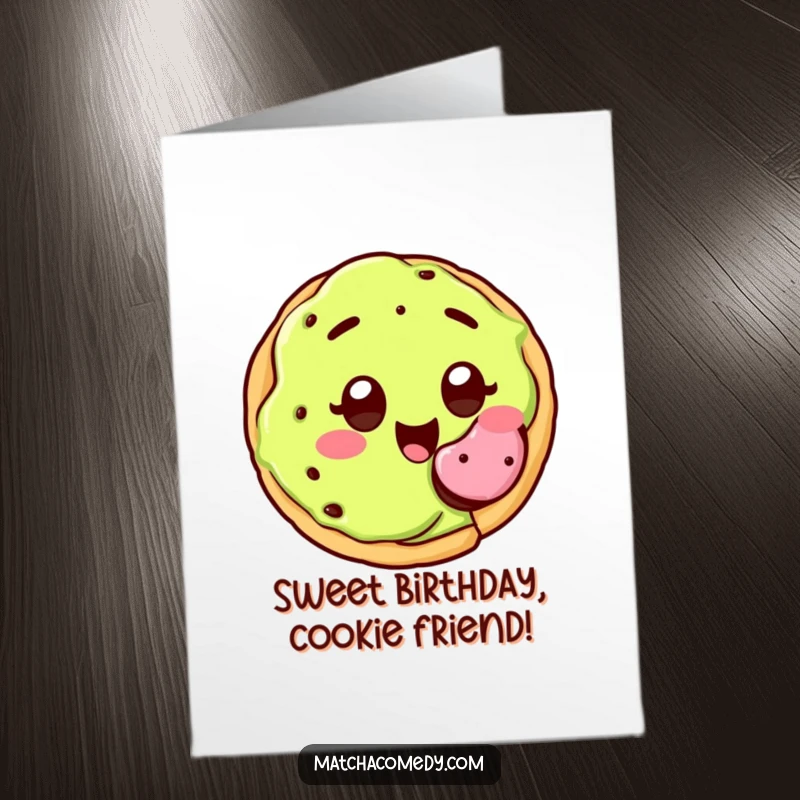 Funny Free Printable Birthday Card: Happy kawaii matcha cookie with wide eyes, offering a bite.