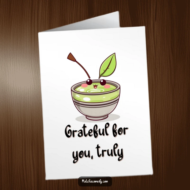 Funny Free Printable Thank You Card of a Kawaii matcha bowl character looking amused by a gently floating leaf.
