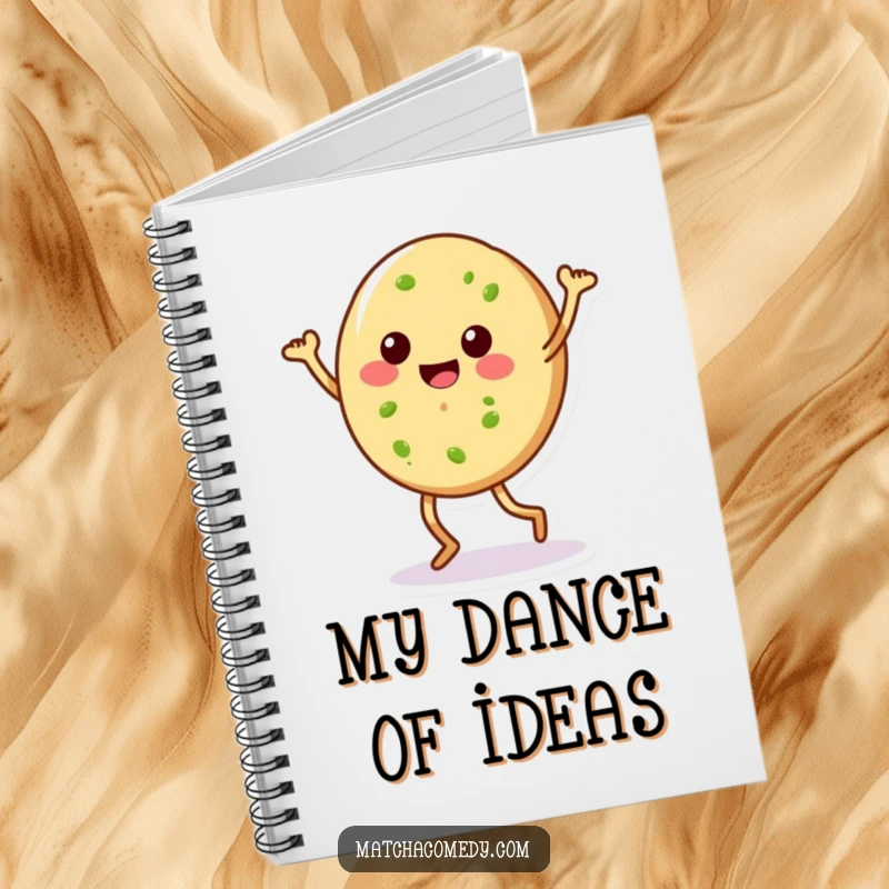 Funny matcha cookie with legs doing a silly dance, gracing the cover of a notebook. Ideal for jotting down creative thoughts.