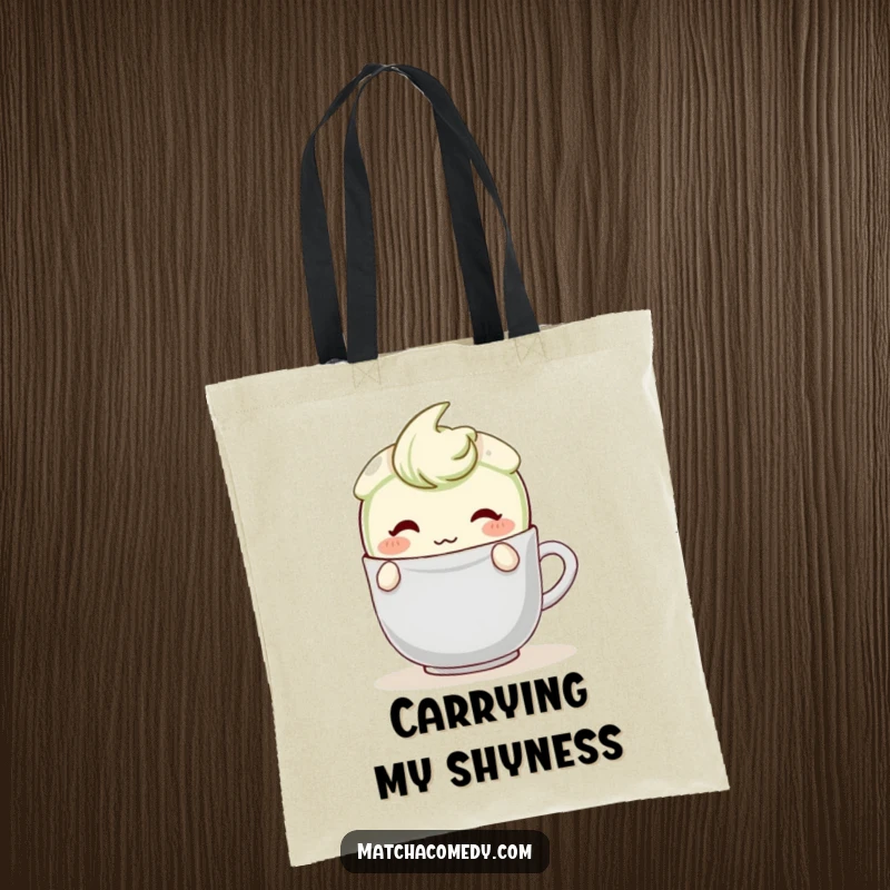 Funny Matcha Latte Tote Bag with a shy, blushing character hiding behind a teabag, showcasing its sweet and charming design.