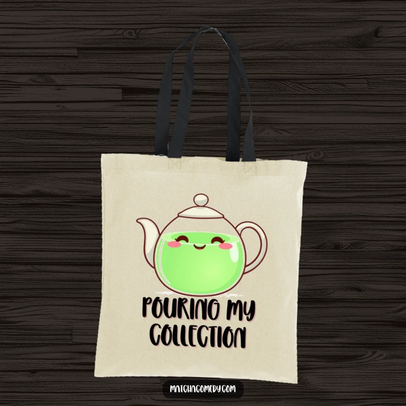 Funny teapot with a happy face pouring green liquid, on a stylish and functional tote bag.